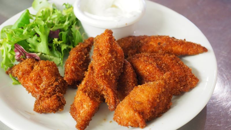 Wing Snob crispy chicken tenders with dipping sauce